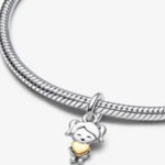 Niña corazón dorado