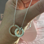 Collar doble círculo plata rose con logo